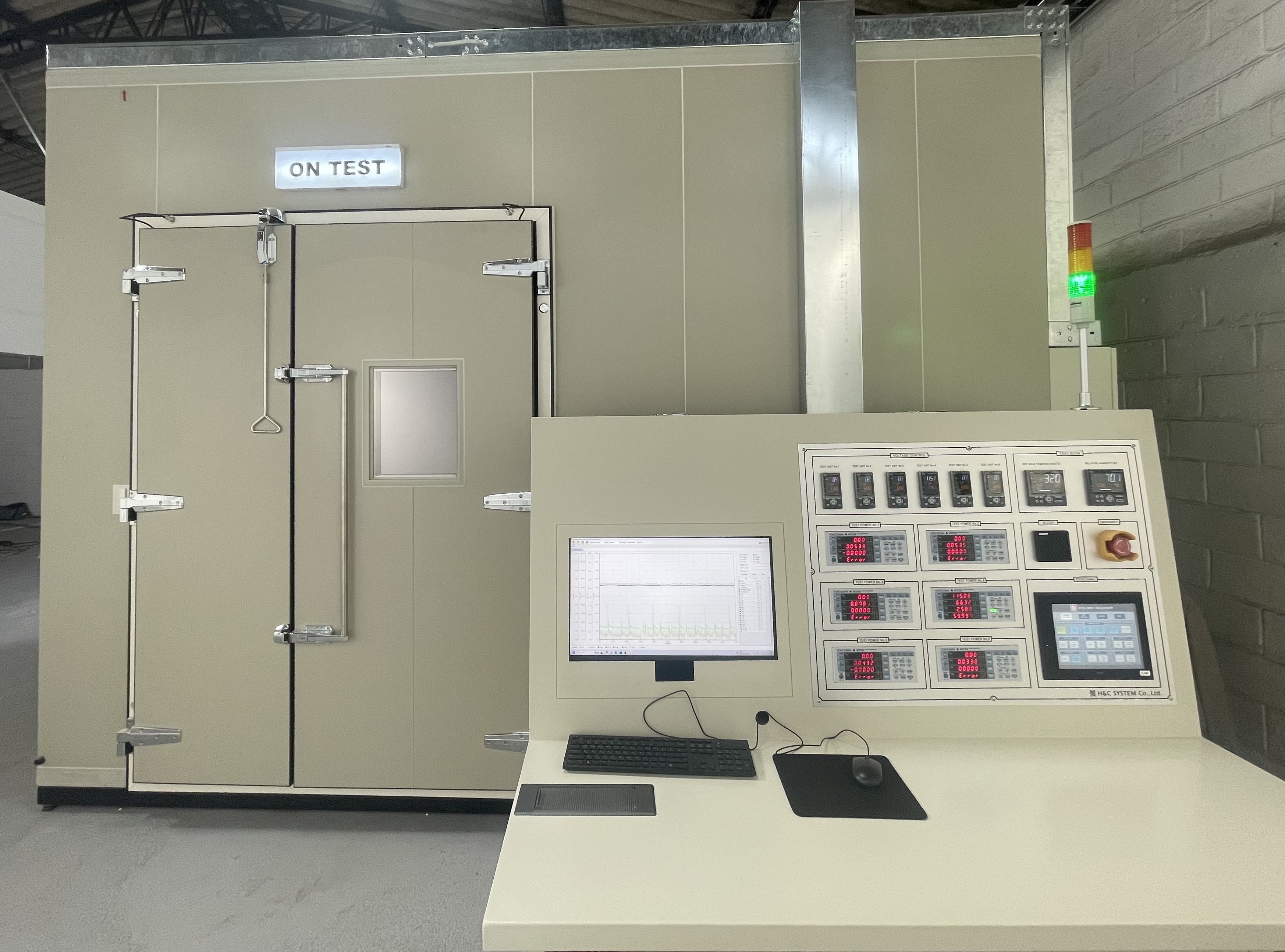Large environmental test chamber with a monitoring console